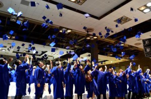 Grads throwing caps 